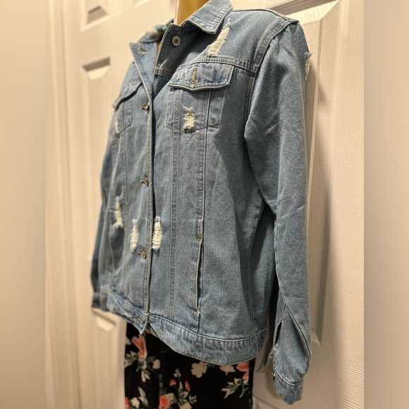 Denim jacket. Size medium. Distressed. Loose fit. - Picture 8 of 11